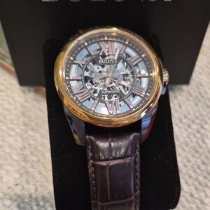 Bulova Gold-Tone Skeleton Dial Watch with Brown Strap